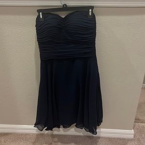 A dark blue strapless dress. It is simple and super cute!